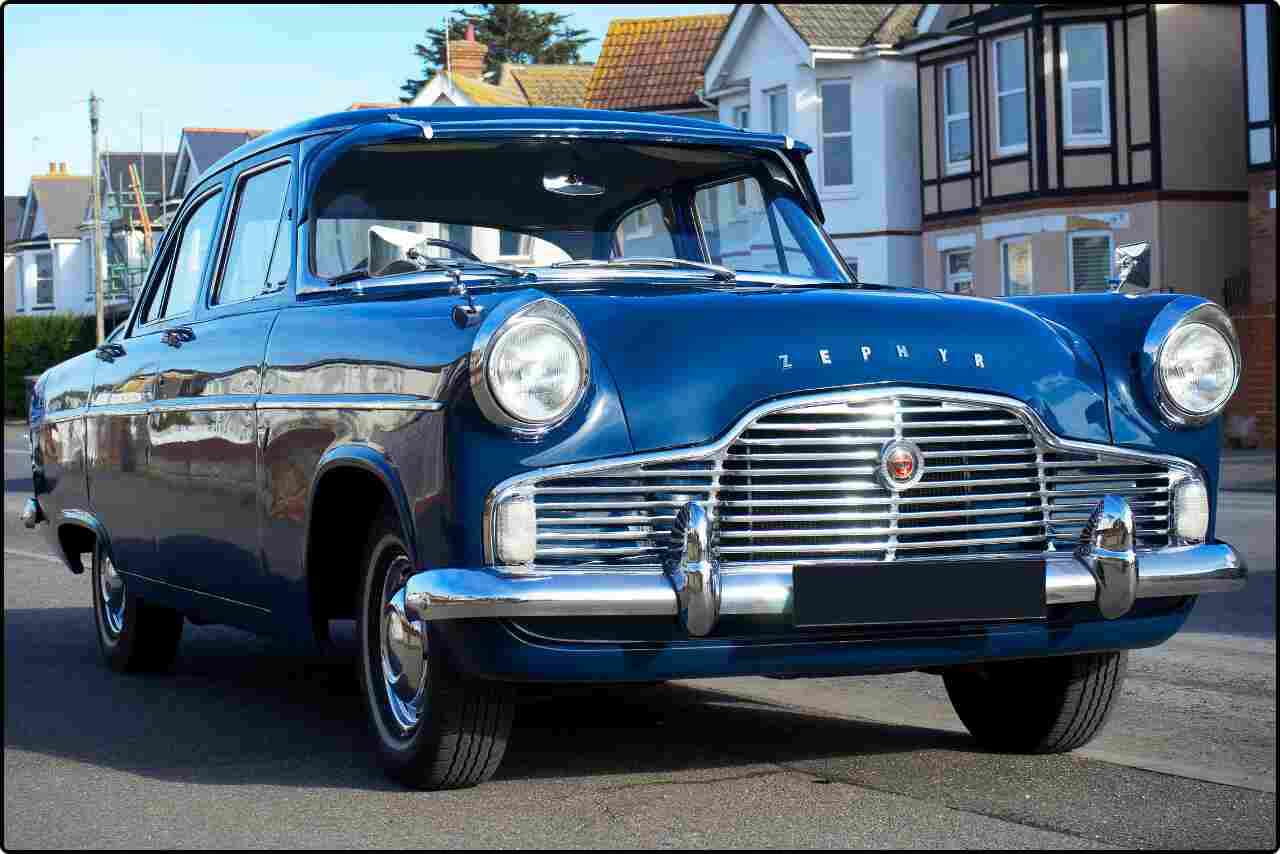 Photograph of a blue Zephyr car parked on a street.